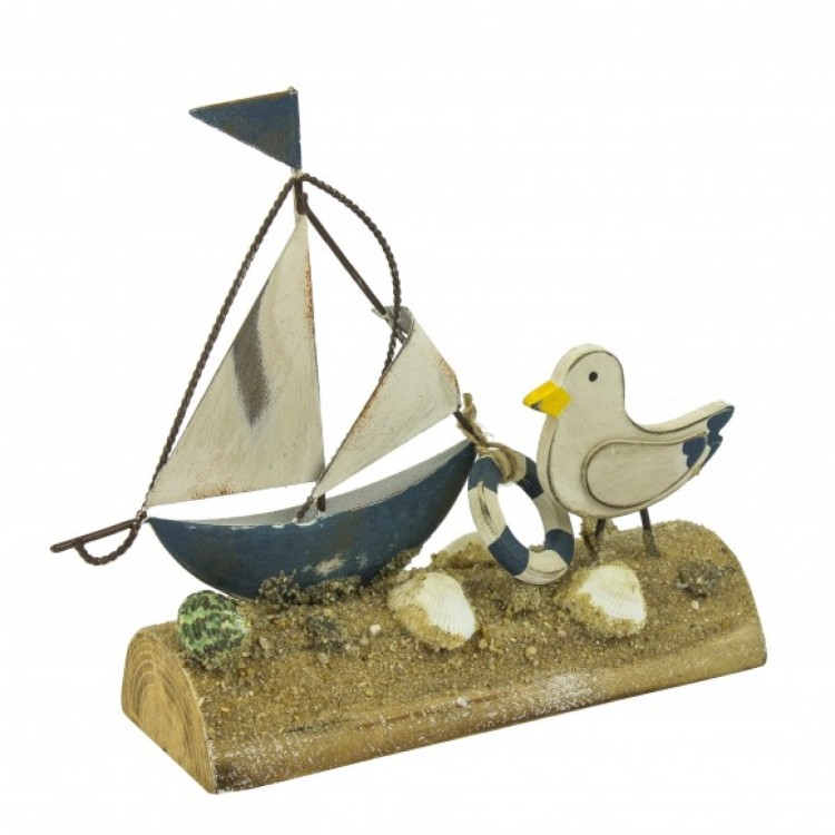 Metal sailboat with bird